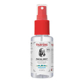 Thayers facial mist bottle in hand showing portable hydration for all skin types.