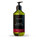 The Art of Shaving sandalwood pre-shave oil bottle close-up showing premium bottle