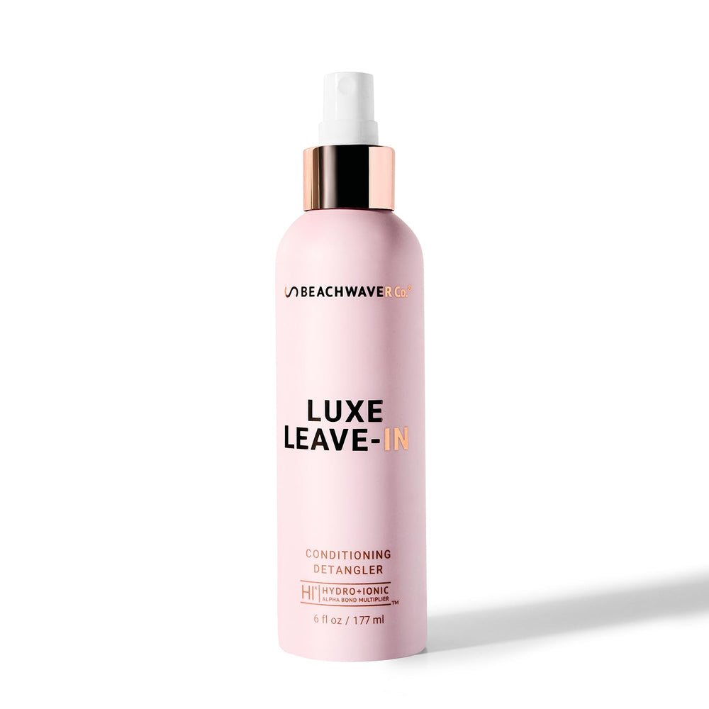 The Beachwaver Co Luxe Leave-In Detangler bottle pour eases detangling and prep