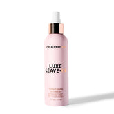 The Beachwaver Co Luxe Leave-In Detangler bottle pour eases detangling and prep