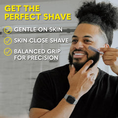 The Beard Club boar bristle brush distributes oil for shine.