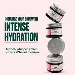 The Body Shop Vitamin E Intense Moisturizer texture close-up showing silky, non-greasy feel.