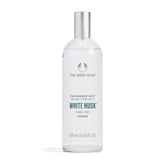 The Body Shop White Musk bottle pour—refreshing spritz for any moment.