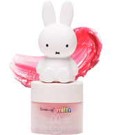 The Crème Shop Miffy bálsamo labial colorido con tapa de Miffy para llevar.