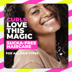 Applying The Doux Bonita Afro Balm on damp curls enhances shine.