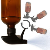The Green Alcove 360° spray bottle angled pour for efficient plant misting.