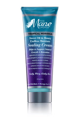 The Mane Choice Tropical Moringa sealing cream jar closeup highlighting rich moisture for curls.
