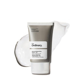 The Ordinary Natural Moisturizing Factors and Hyaluronic Acid bottle close-up for lightweight hydration.