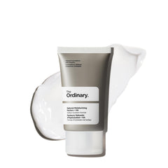 The Ordinary Natural Moisturizing Factors and Hyaluronic Acid bottle close-up for lightweight hydration.