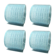 The UM24 rollers in use on damp hair to create defined volume.