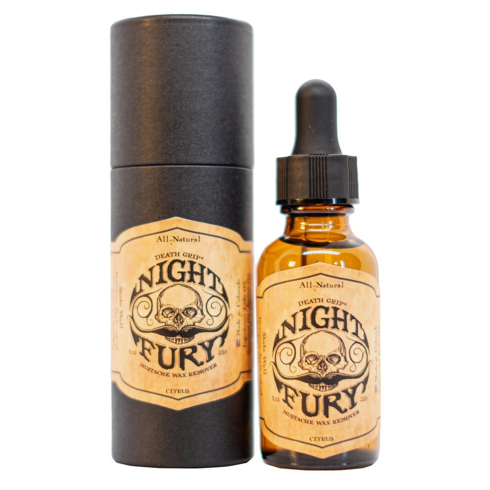 The Vintage Grooming Co Night Fury Oil bottle for gentle wax removal.