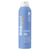 Thinksport SPF50 mineral spray, aplicación frontal, protección solar clara y suave para piel sensible.