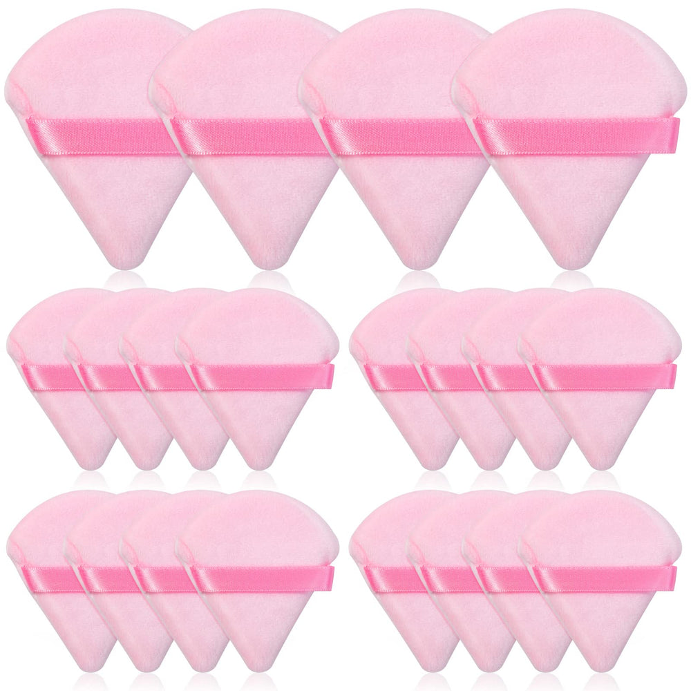 Thrilez pink triangle powder puff for precise powder placement on the face.