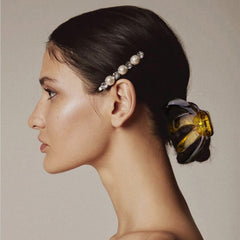 Tihebax transparent clip adds subtle shine while keeping fine hair in place.