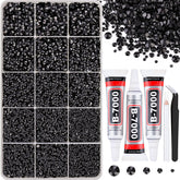 Piedras de resina negra de TINKRSTUFF en caja con rejillas para manualidades.