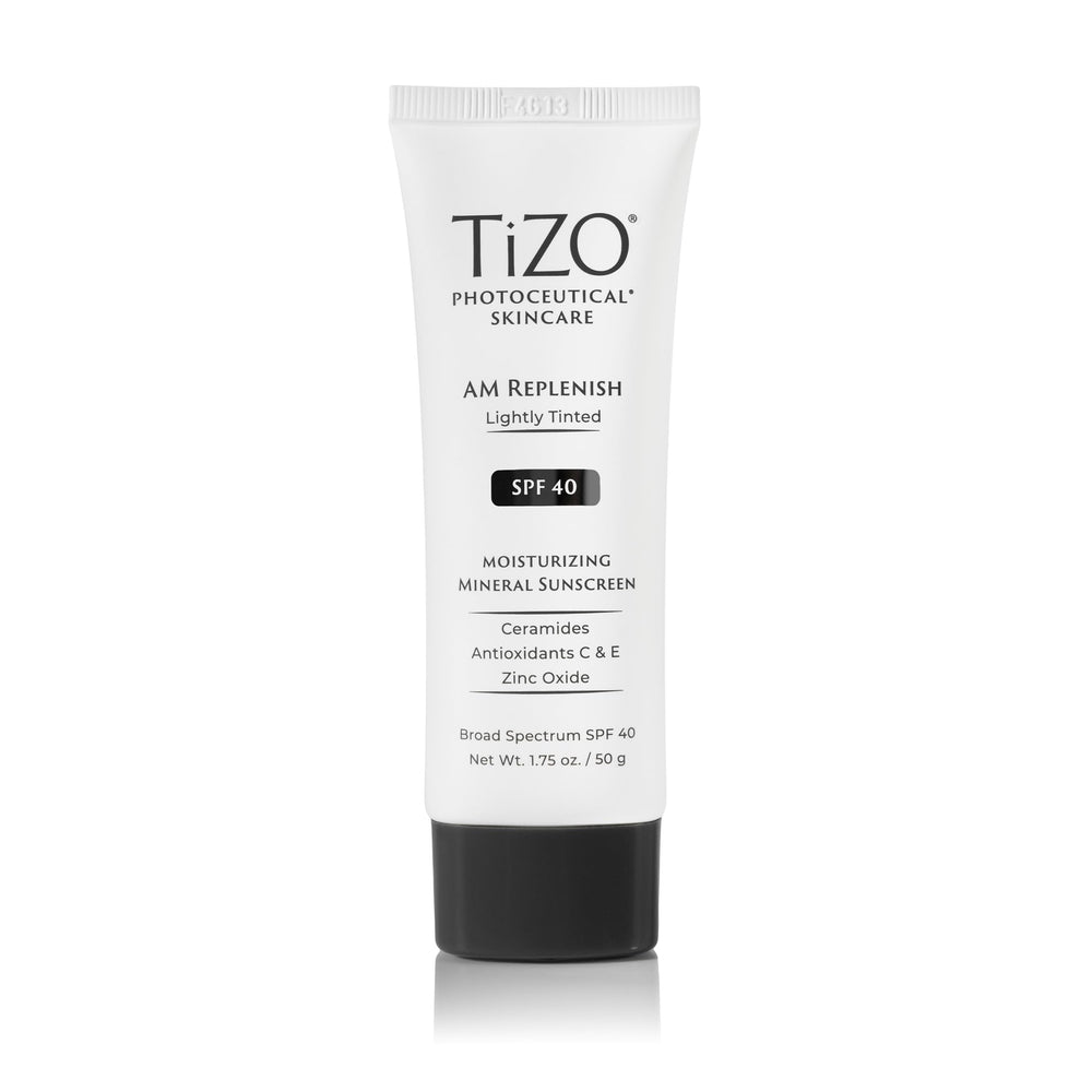 TIZO AM Replenish SPF 40 bottle front with light tint for daily protection.