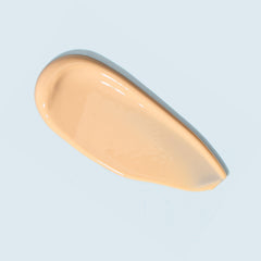 TIZO label close-up highlights zinc oxide filter and sheer tint