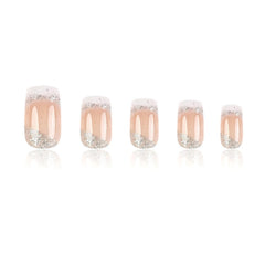 TOGZOM nail kit includes 24 nails, jelly adhesive, file, and remover stick.