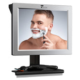 ToiletTree fogless shower mirror with squeegee for a fog-free shave in the shower.