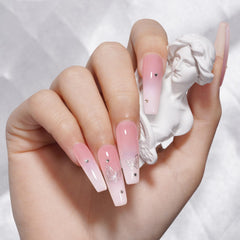 TOMICCA Jelly Pink on nails with a French manicure look.