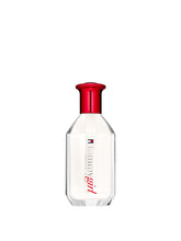 Tommy Hilfiger Tommy Girl Forever bottle pour highlights fresh bergamot and pear notes.