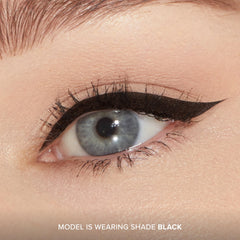 Too Faced dual-fiber brush close-up enables precise control.