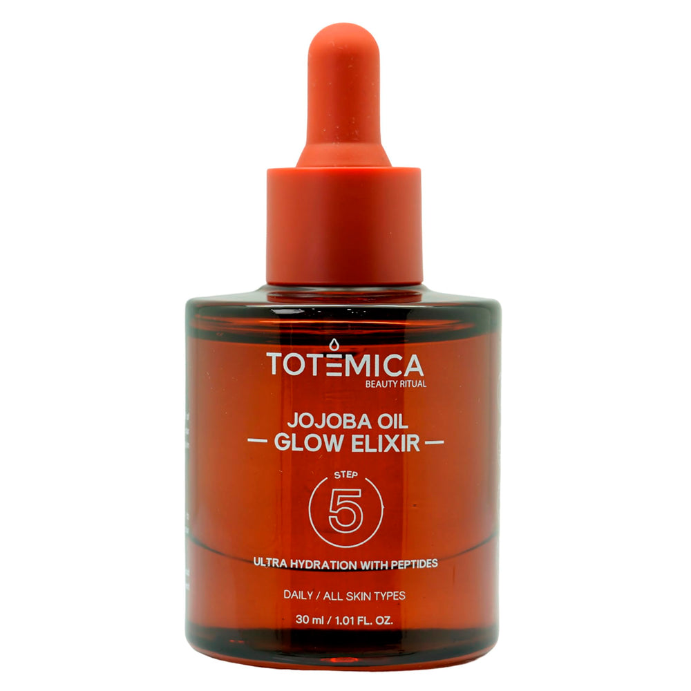 TOTEMICA Jojoba Oil Glow Elixir bottle shows lightweight hydration for radiant skin.