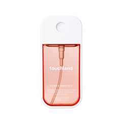 Touchland Peachy Lychee bottle showing a refreshing fragrance for body and hair.