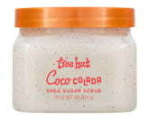 Tree Hut Coco Colada exfoliante de azúcar, textura granulosa y brillo suave.