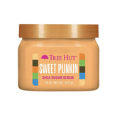 Tree Hut Sweet Punkin Sugar Scrub bottle pouring for a luxurious exfoliating ritual.