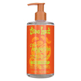 Tree Hut Tangerine Serum-Infused Hand Wash bottle on sink, nourishes skin with citrus-infused care.