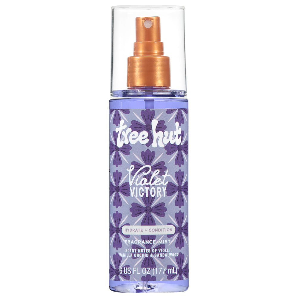 Tree Hut Violet Victory fragrance mist bottle on vanity, offering hydration and a calming scent.