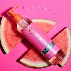 Tree Hut Watermelon Shave Oil bottle close-up with skin-loving oil blend.