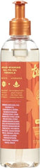 Tree Hut Golden Vanilla Shave Oil being poured to demonstrate glide