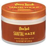 Tree Hut Whipped Shea Body Butter Santal Haze, textura ligera y absorción rápida para piel suave.