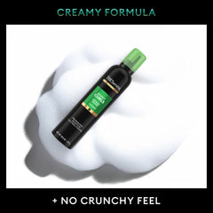 Mousse dispense image focuses on pump providing lightweight, non-crunch hold