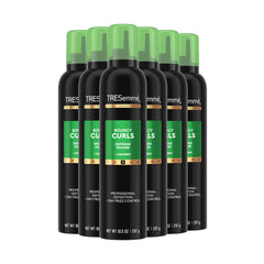 TRESemmé Flawless Curls mousse pack shot highlighting a 6-pack and coconut avocado hydration