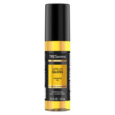 TRESemmé Lamellar Gloss Oil bottle pour for instant shine and smoothness