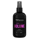 TRESemmé One Step Volume Mist at roots for lifted, weightless volume.