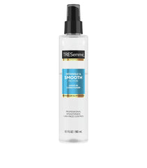 Model with soft, smooth, manageable hair after using TRESemmé Pro Pure Leave-In Conditioner.