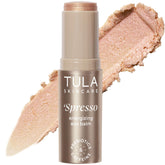 TULA Spresso Americano Eye Balm being applied for instant refresh around the eyes.