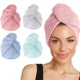 Turbie Twist microfiber hair towel in pink close-up, plush and absorbent for quick drying.