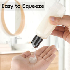 TUZAZO transparent 3.4 oz bottle ideal for quick content checks.