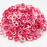 TVINLIK baby hair ties in mixed pink for gentle, snag-free ponytails.