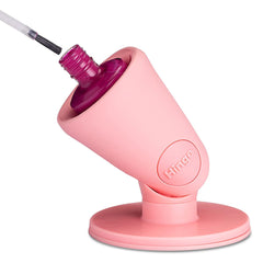 Tweexy Hinge untippable nail polish bottle holder with angled hold for precise application.