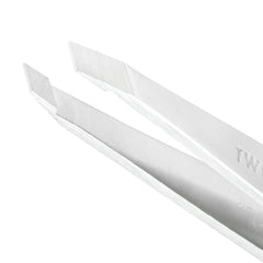 Tweezerman brow tweezer in use for clean, accurate grooming