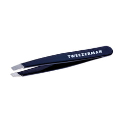 Tweezerman Evening Blue Mini Slant Tweezer closeup highlighting precise brow shaping