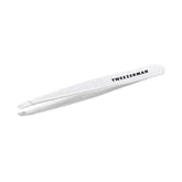 Tweezerman Moon Dust Slant Tweezer close-up with aligned tips for precise brow hair removal.