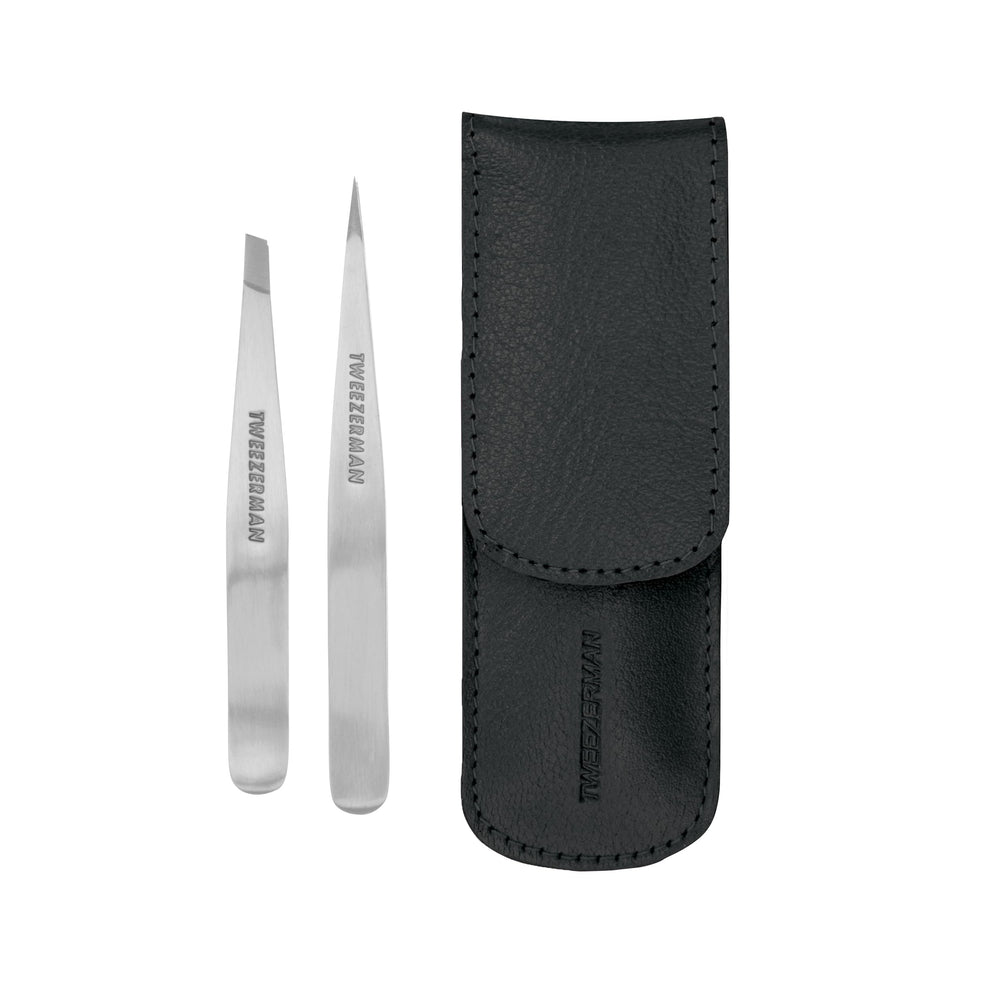 Tweezerman Petite Slant Tweezer close-up showing aligned tips for precision grooming.