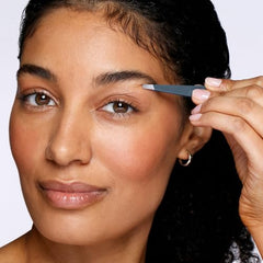 Aligned tips of Tweezerman slant tweezer for reliable brow hair removal.